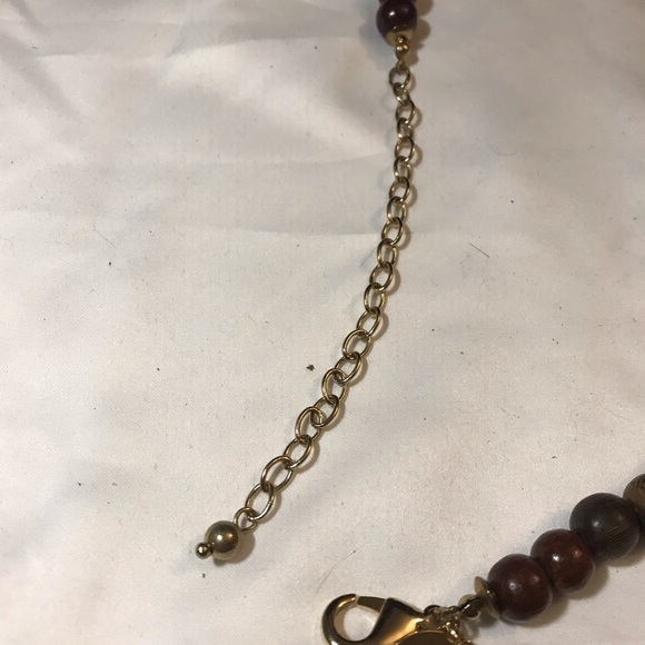 Large suede tassel with an array of colored beads necklace - Picture 3 of 3